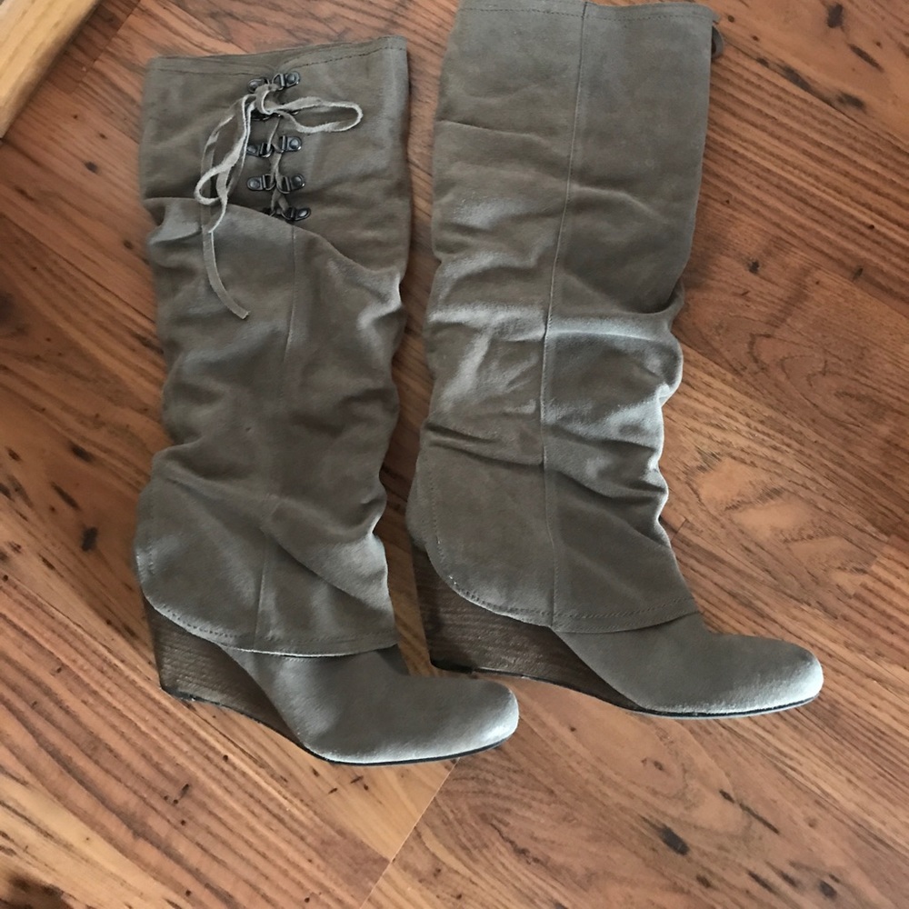 Naughty Monkey 🐒 sued slouch boots.